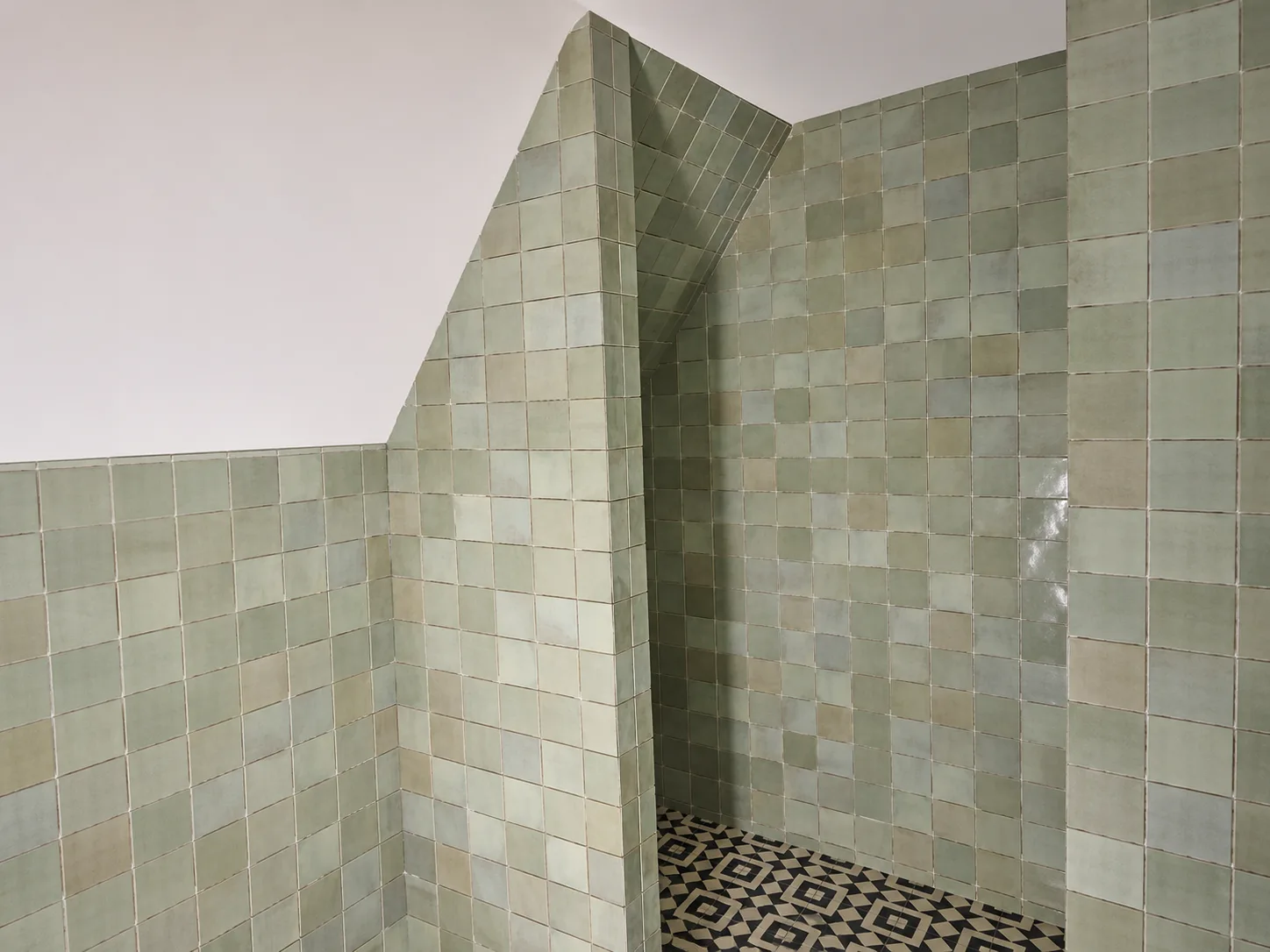 Wall tiling completed in a London bathroom