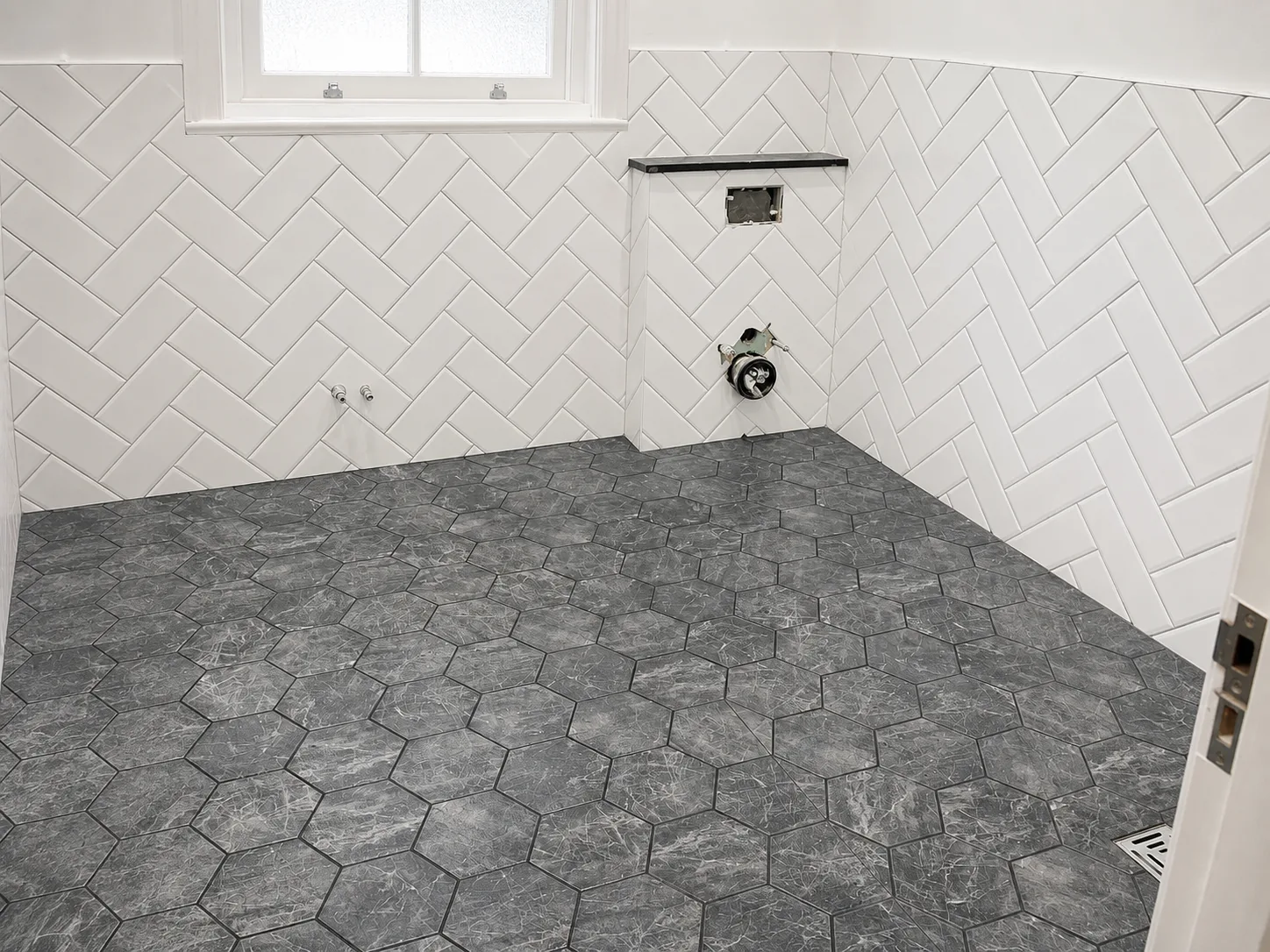 Period geometric tiled floor with border detail